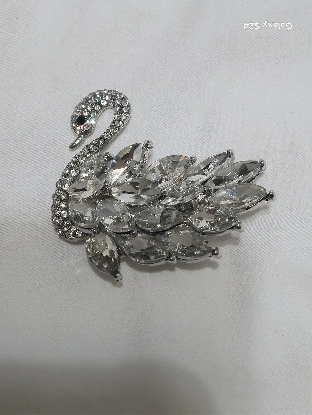 Source Unknown silver toned